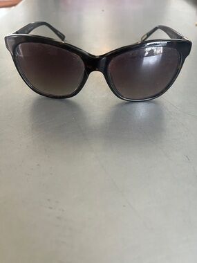 Solvair - sunglasses 

Classic Black Cat-Eye Sunglasses - Women's Accessories